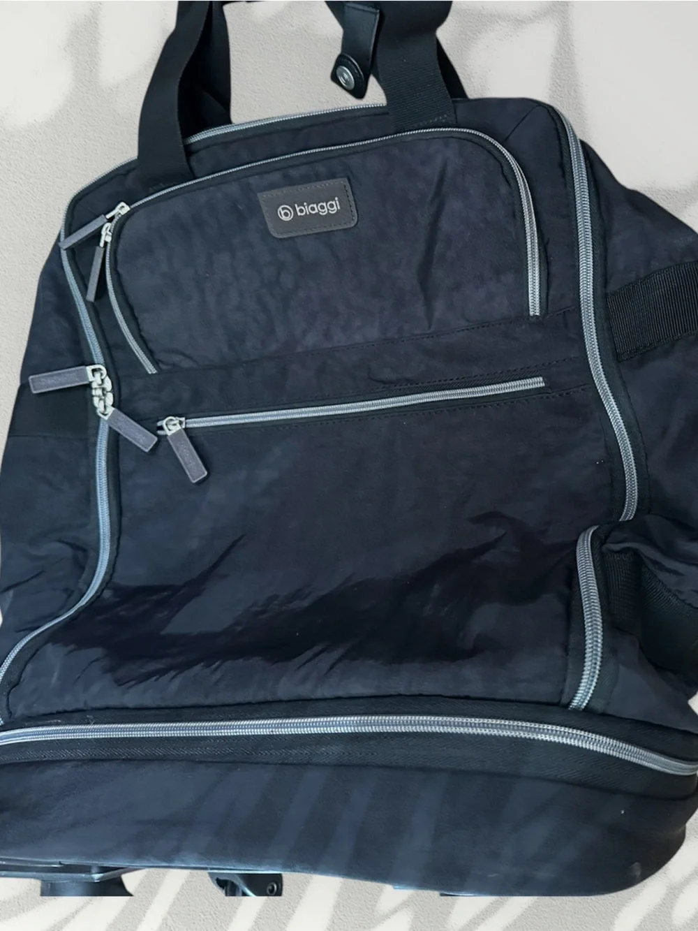 Biaggi roller bag duffel compact 4 wheels black like new 17” high luggage